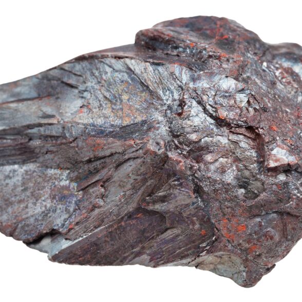 macro shooting of specimen of natural mineral - piece of Hematite (iron ore, haematite) stone isolated on white background