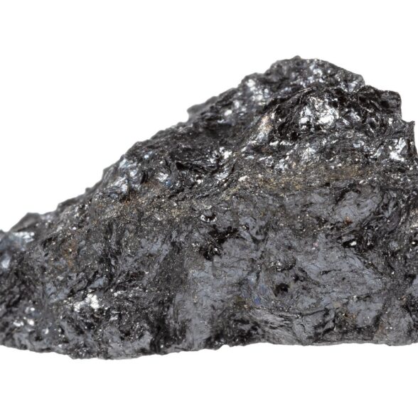 close up of sample of natural stone from geological collection - raw hulsite mineral isolated on white background from Yakutia